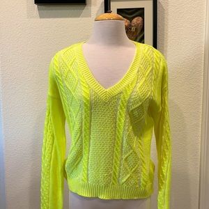 NWT… Brighten everybody’s day in this magnetic sweater.